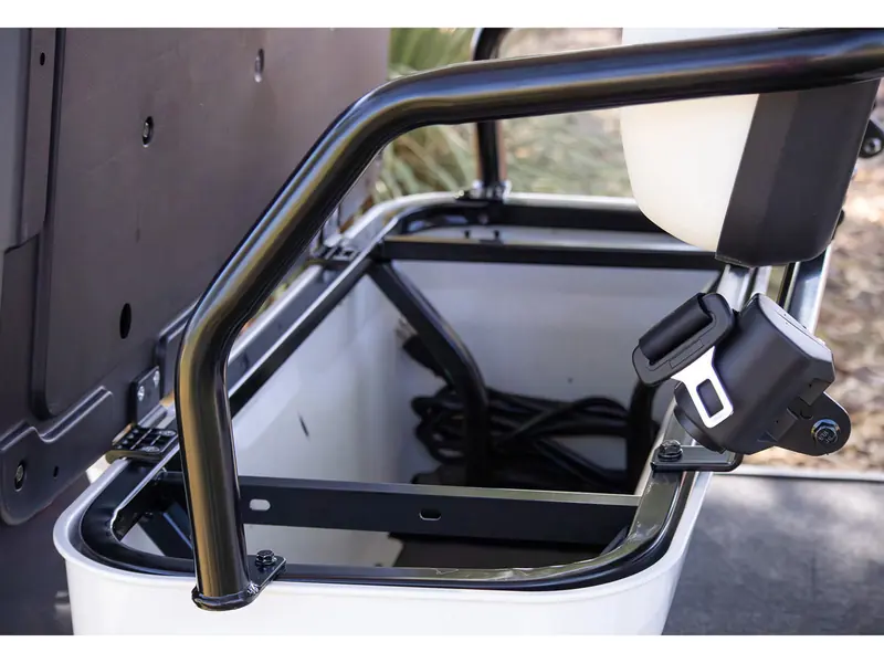 Under-seat storage compartment with seatbelts