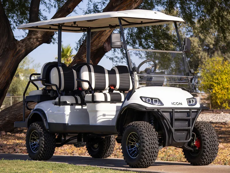 Passenger side of a white six-seat golf cart